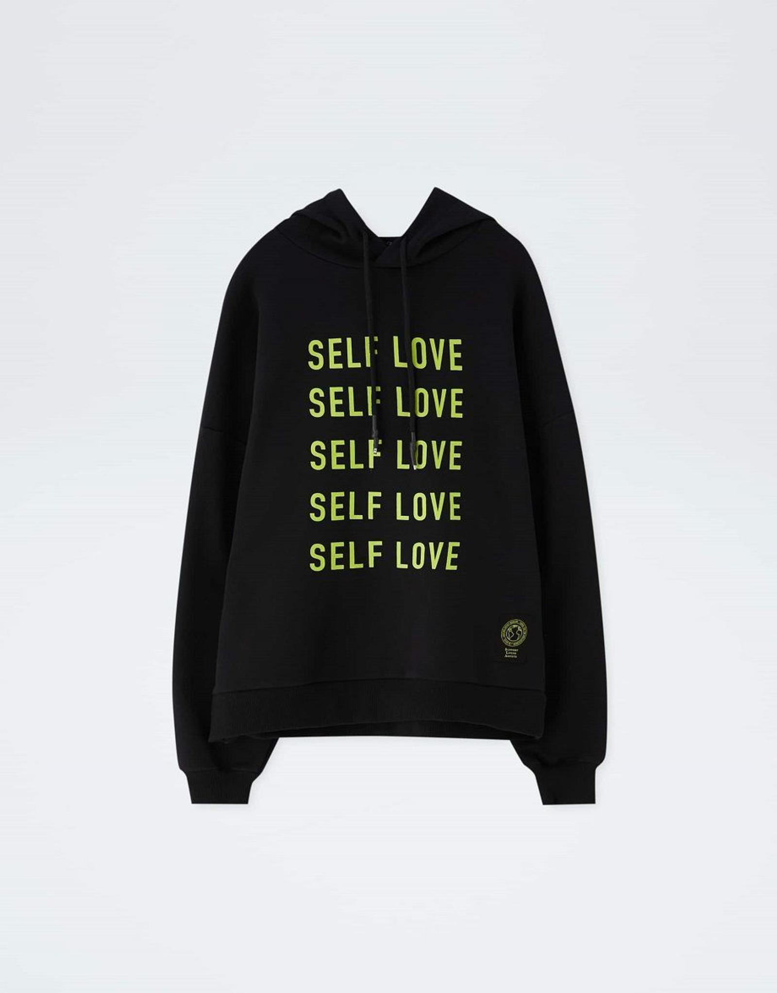 6 Sweatshirt Ini Bikin Penampilanmu Sekeren Ariana Grande