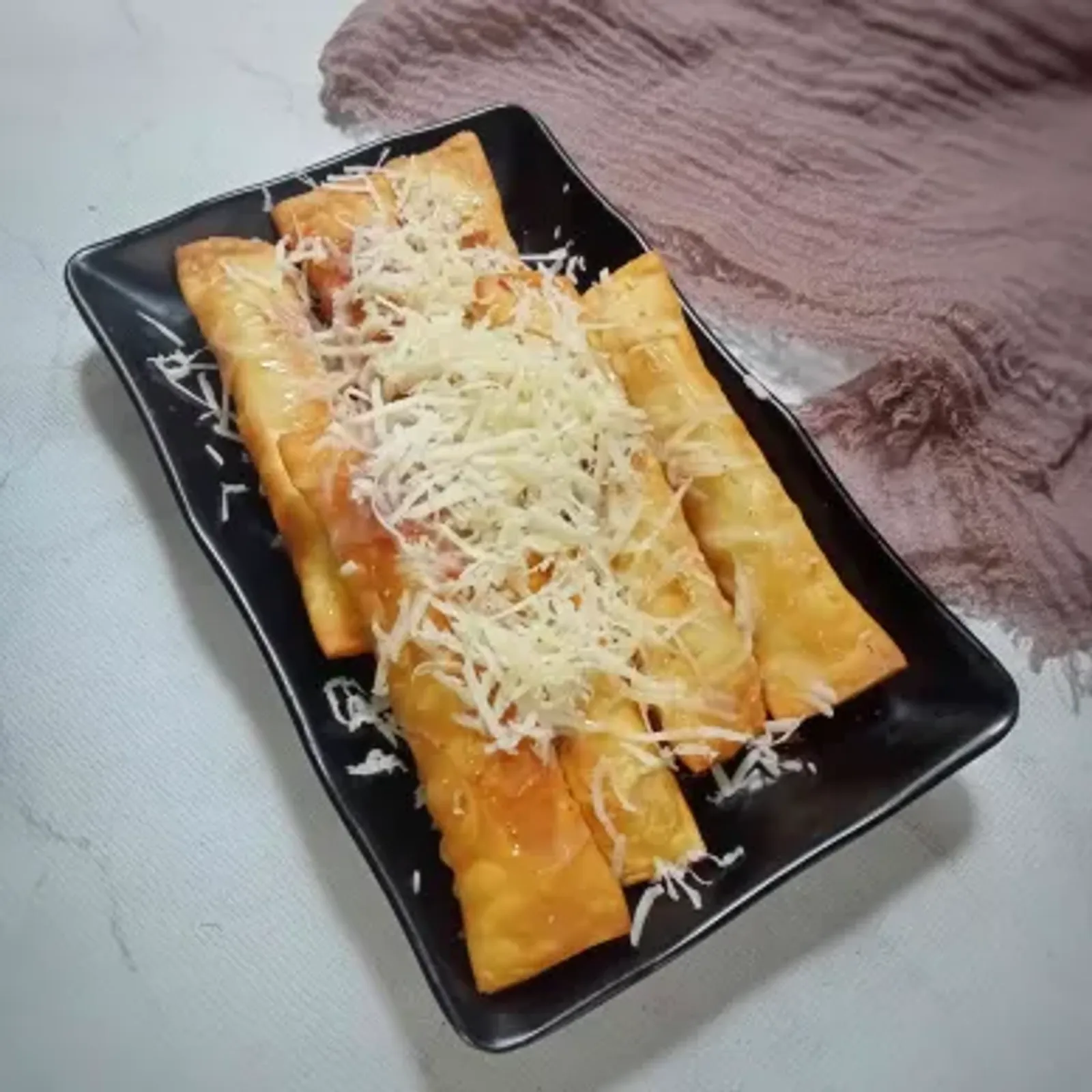 Camilan yang Nikmat, Ini Resep Banana Cheese Roll yang Mudah Dibuat
