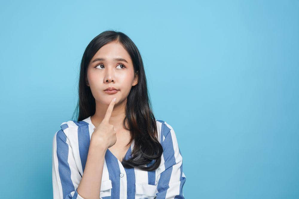 Ilustrasi perempuan sedang bertanya-tanya