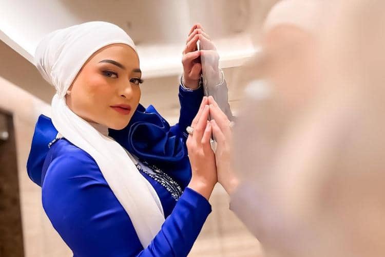 instagram.com/nathalieholscher