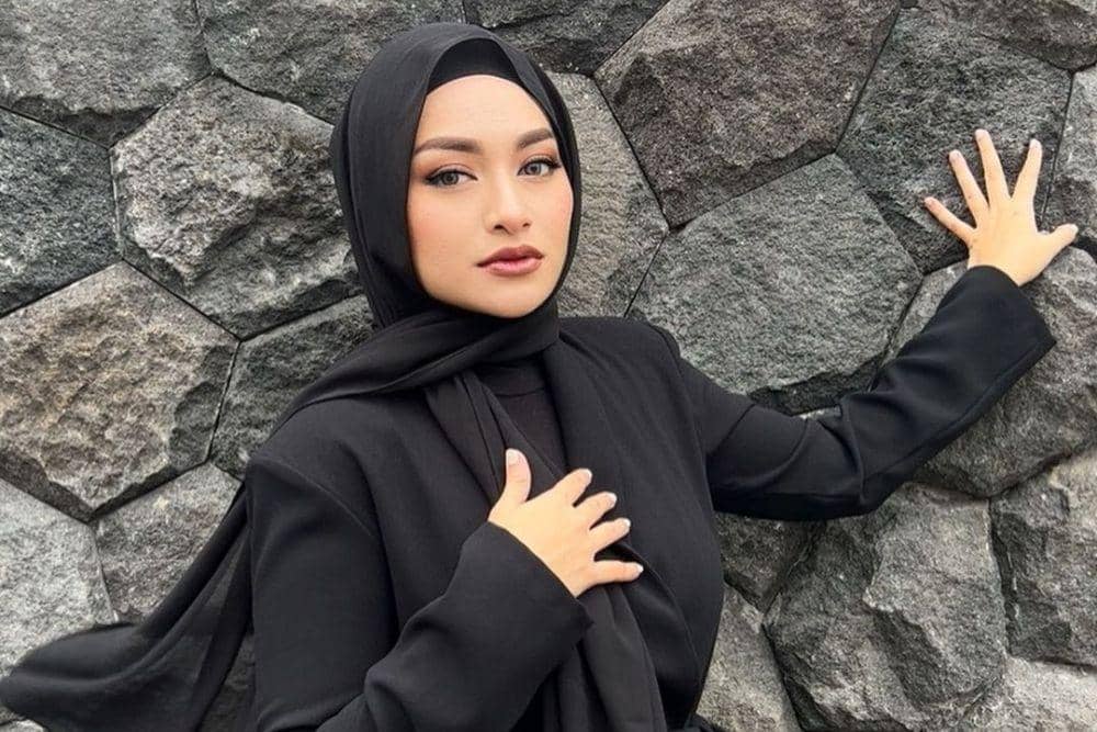 instagram.com/nathalieholscher