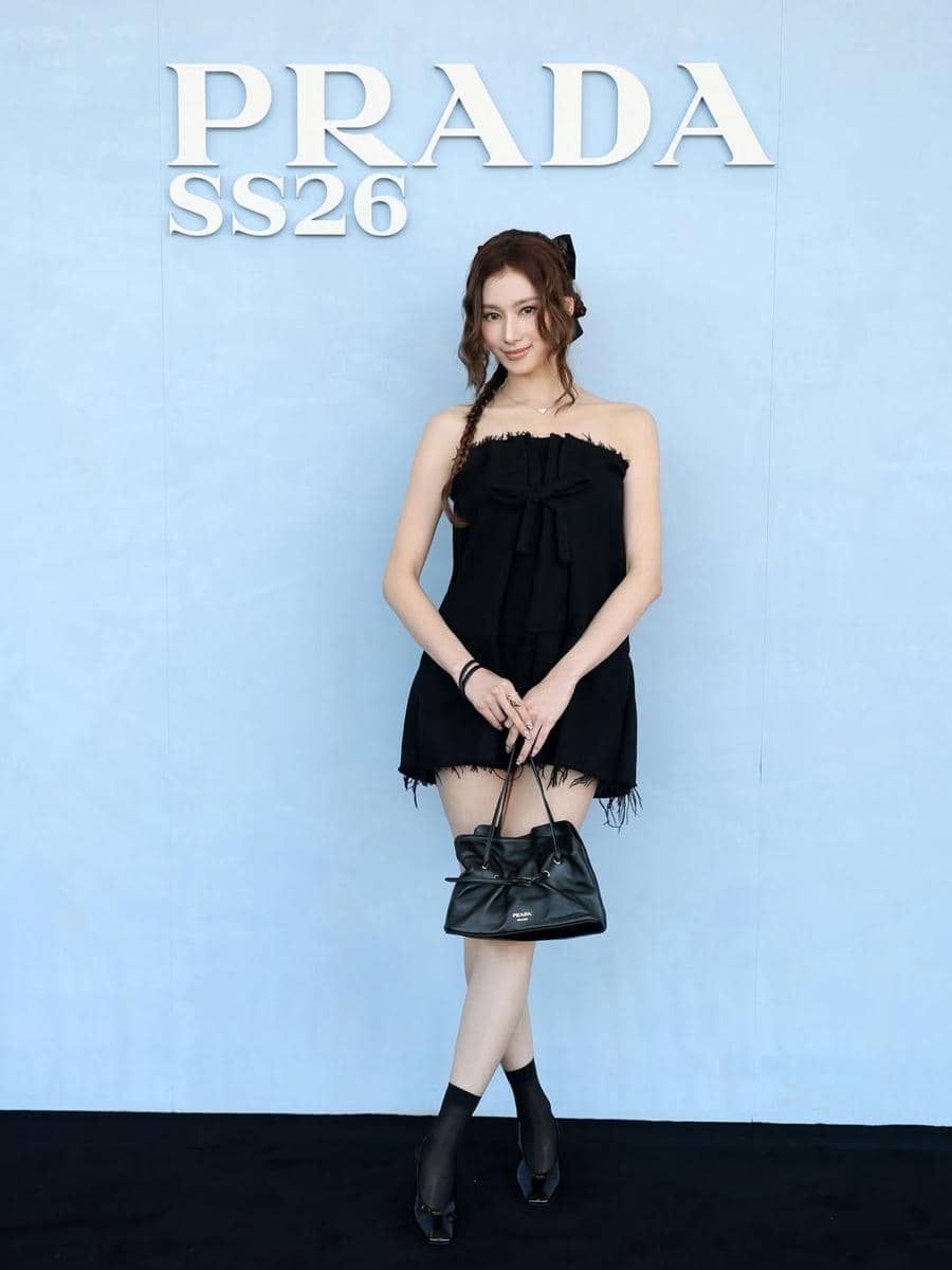 Stars who shone in black at @prada’s SS26 Uomo show in Milan included house ambassadors @m.by__sana of @twicetagram and @sakaguchikentaro! Both were spades of strong yet sweet. Swipe for a full view of their immaculate Prada show fits! .jpg