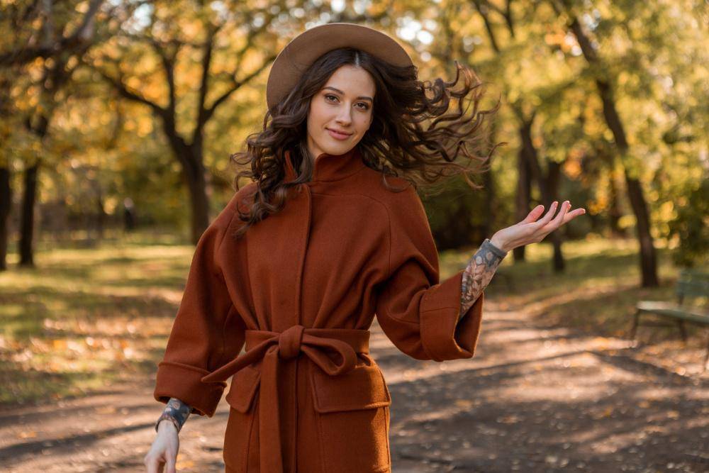 beautiful-stylish-smiling-skinny-woman-with-curly-hair-walking-park-dressed-warm-brown-coat-autumn-trendy-fashion-street-style.jpg