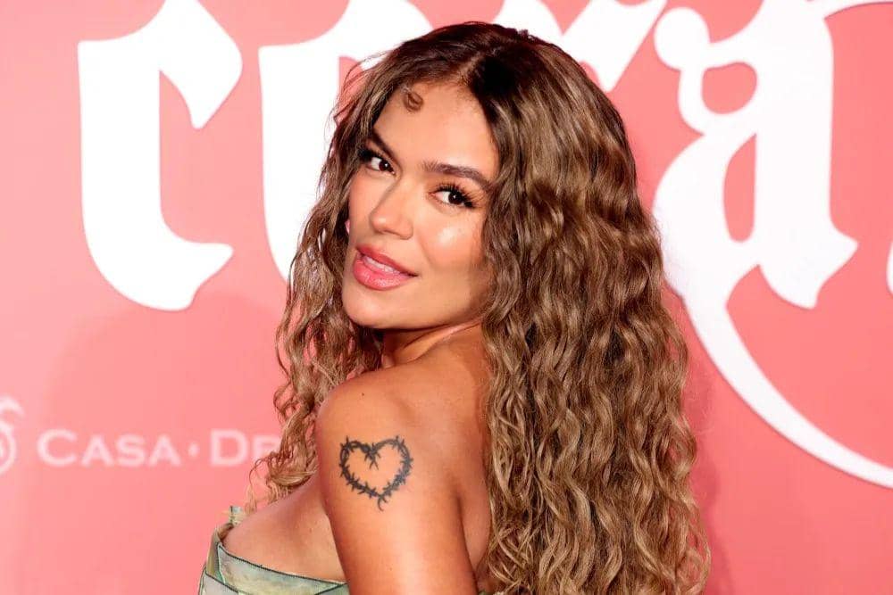 Karol G. (Getty Images/Romain Maurice via variety.com)