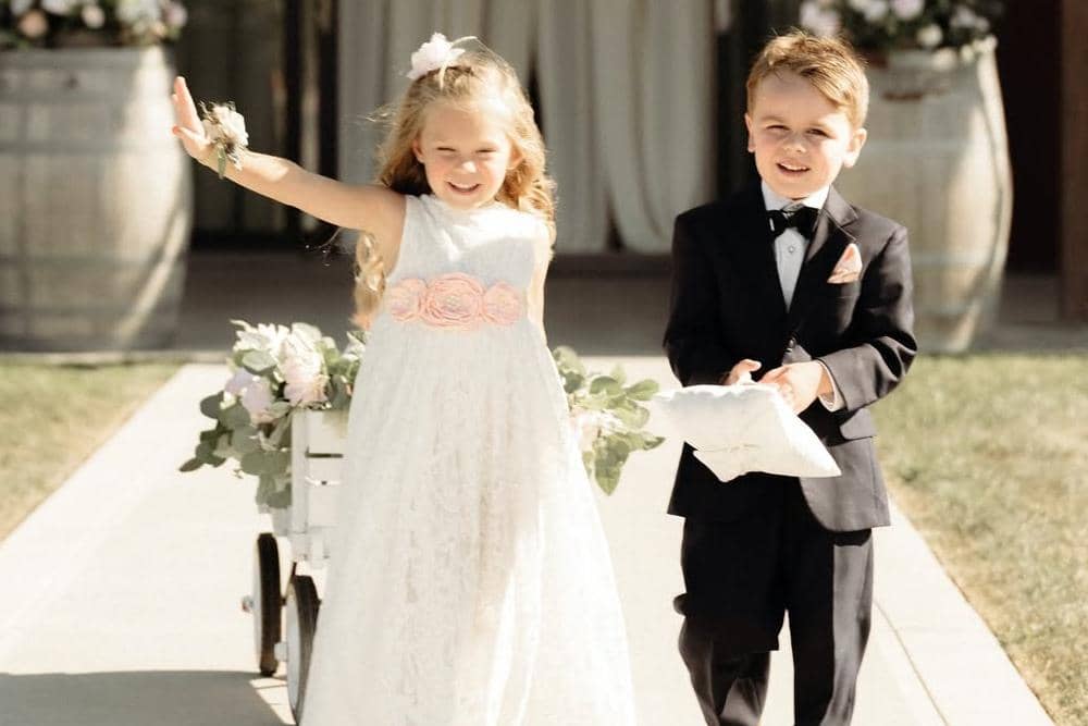 You might be considering having a flower girl and ring bearer at your wedding, but you’re wonder.jpg