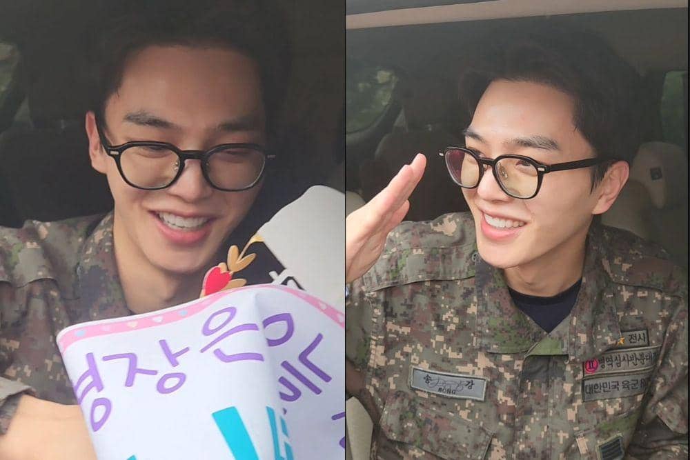 Potret Song Kang saat menyapa dan menerima hadiah pemberian fans yang menyambut kepulangannya usai wamil. (Foto: hellokang_b via X/forskg)