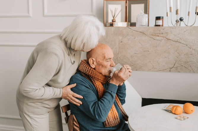 ilustrasi lansia sedang minum 